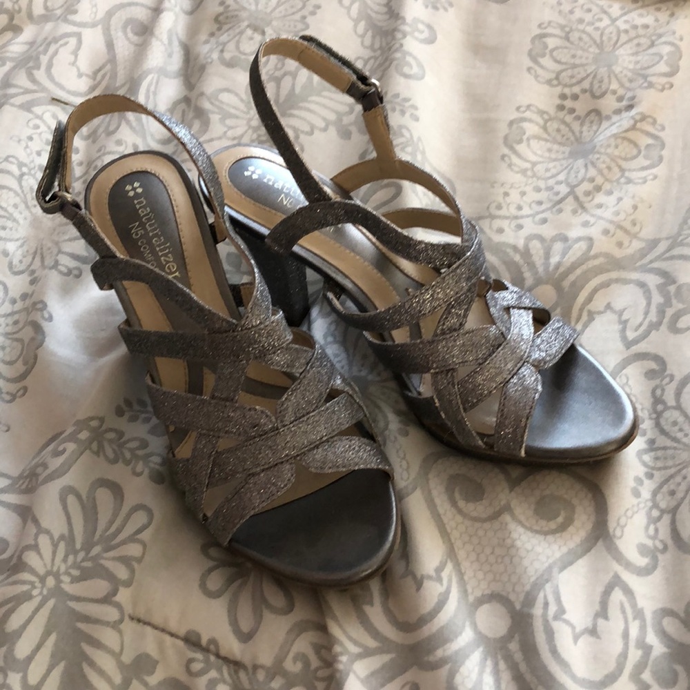 Grey platform sparkly heels.
